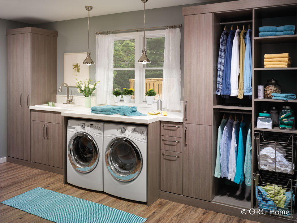 organized laundry room with Stricklands Home