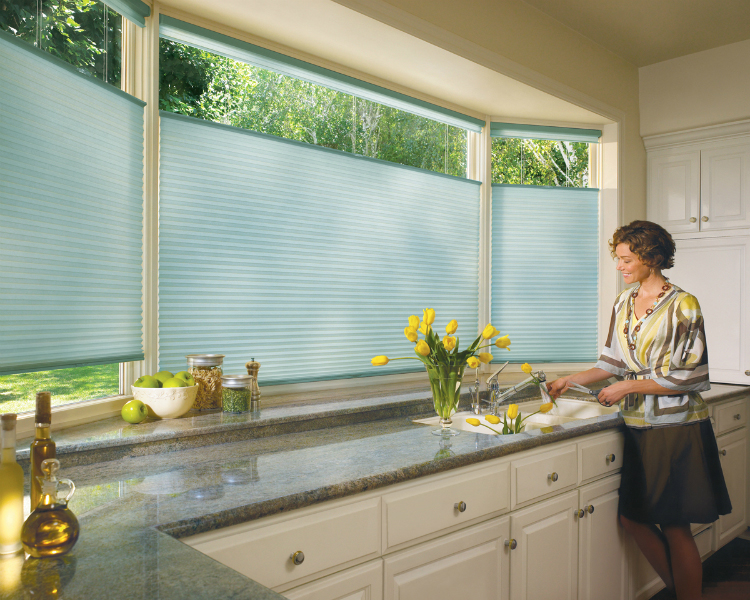 Duette® honeycomb shades with LiteRise® by Hunter Douglas can be ordered in a wide range of colors for every room in the house, but the back sides of the shades are always a neutral white, keeping the outside of your house looking crisp and uniform.